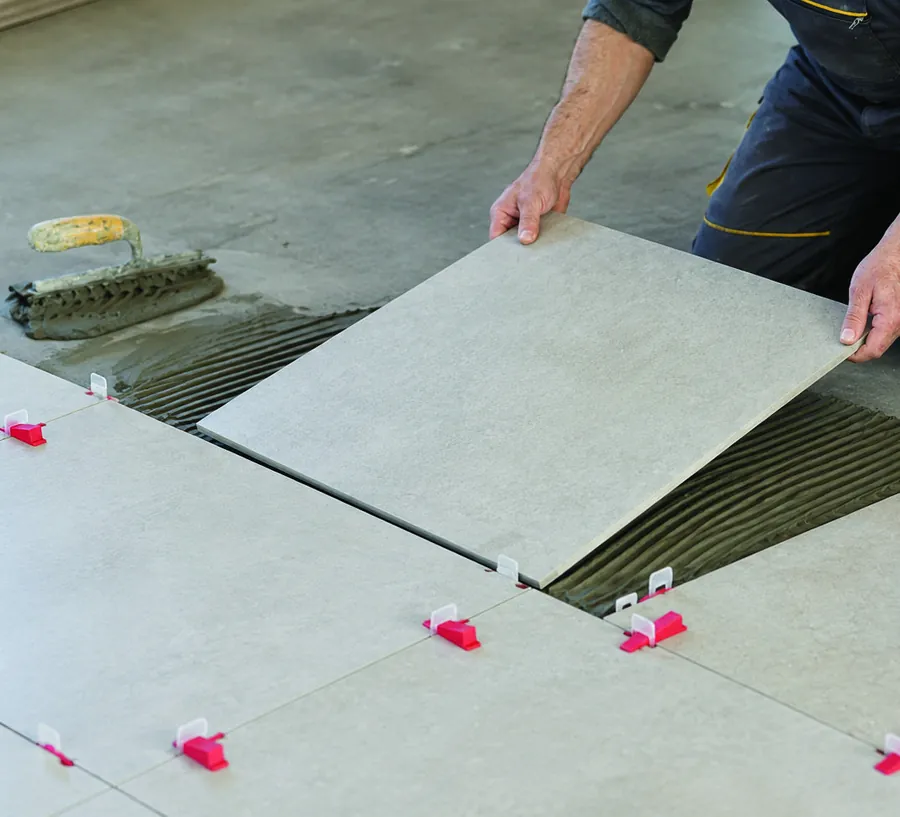 Floor tiles set out with levelling clips